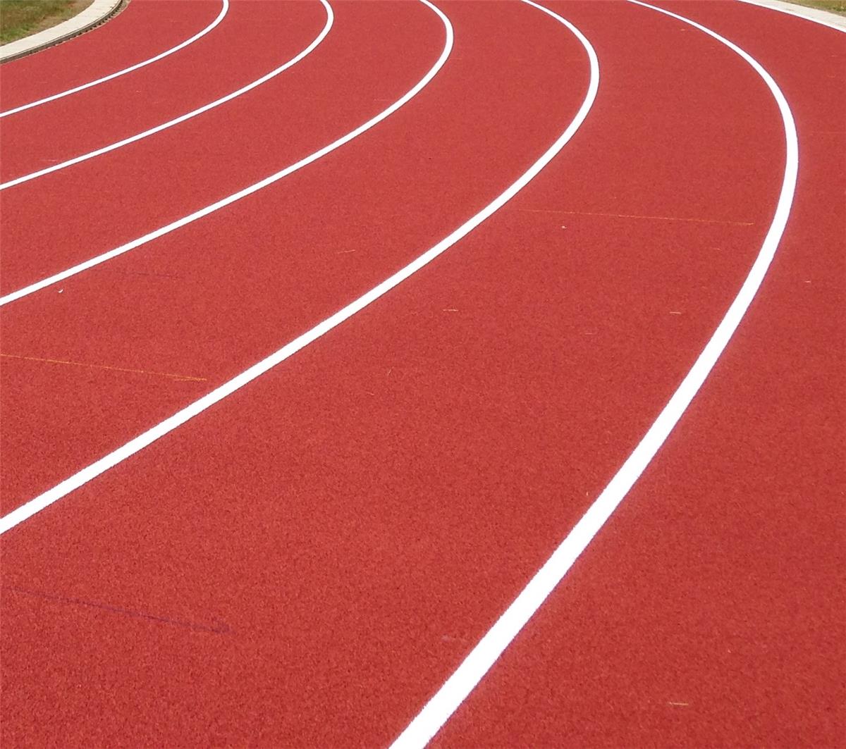 Aanleg kunststof atletiekpiste in PU - Sportinfrabouw NV