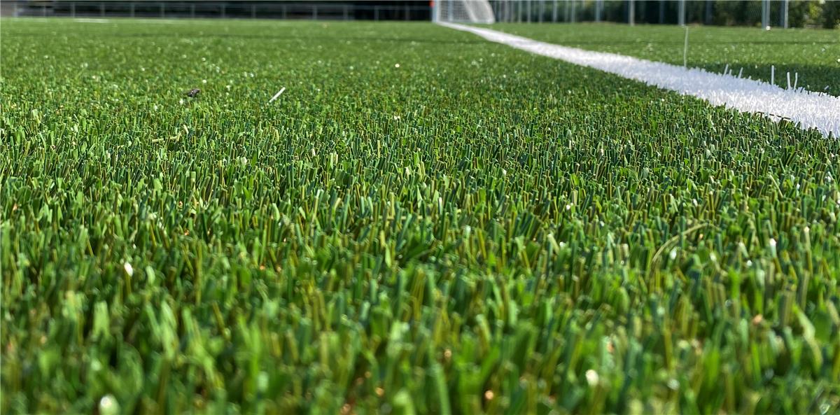 Aanleg kunstgras voetbalveld - Sportinfrabouw NV