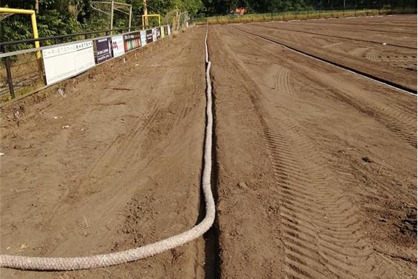 Aanleg kunstgras voetbalveld - Sportinfrabouw NV