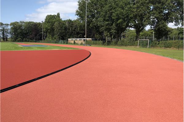 Aanleg kunststof atletiekpiste - Sportinfrabouw NV